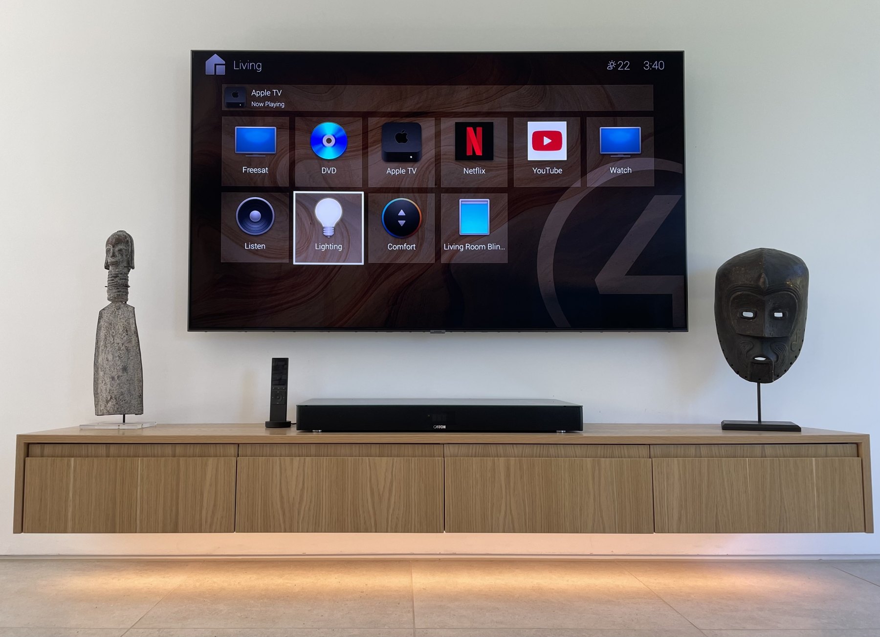 Television and soundbar integrated above a timber cabinet