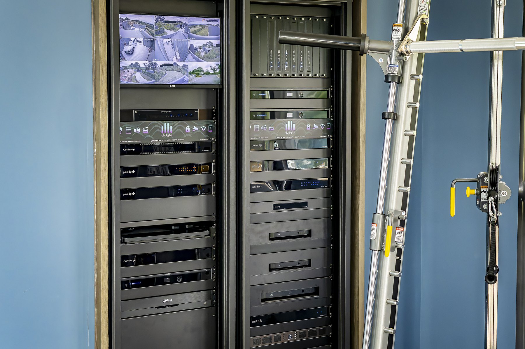 Equipment racks with system monitoring screen