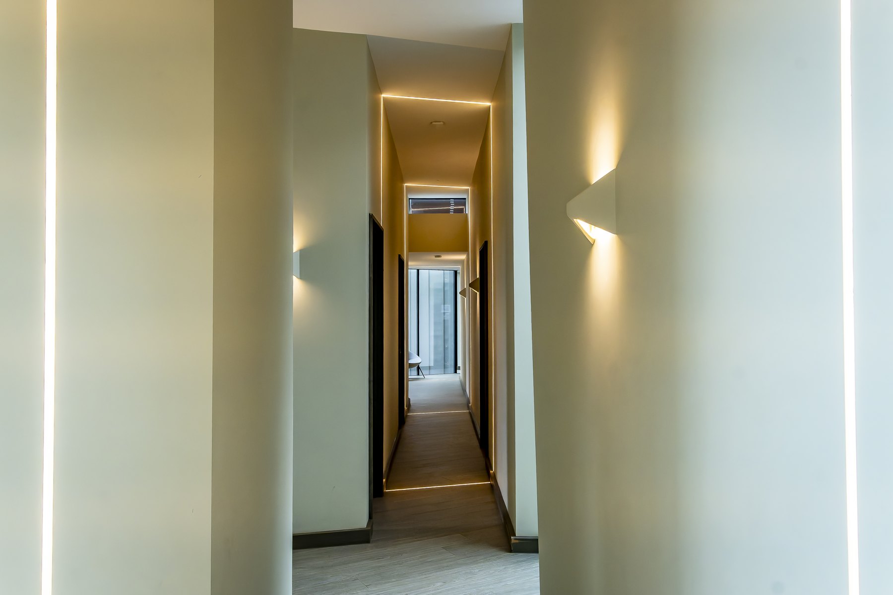 Hallway with integrated architectural lighting