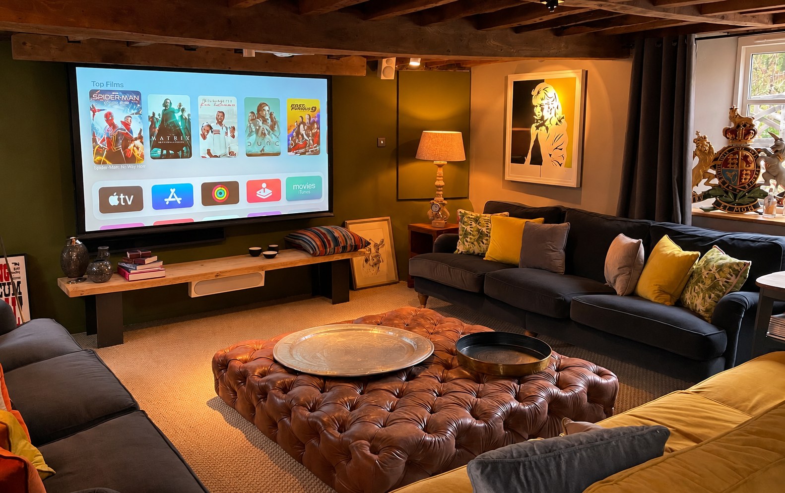 The same media room with its projection screen in use